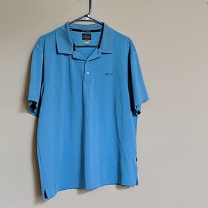 Greg Norman Play Dry bright blue polo